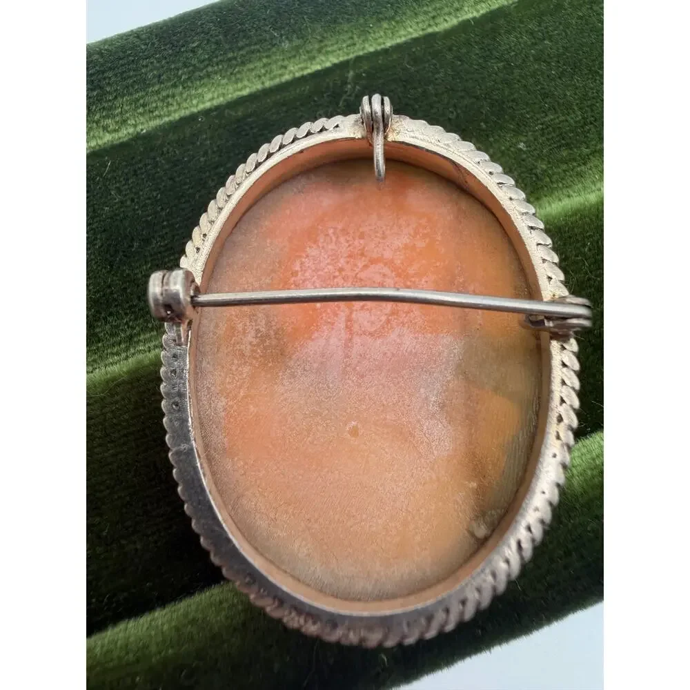 vintage hand-carved shell cameo brooch set in a .925 sterling silver frame